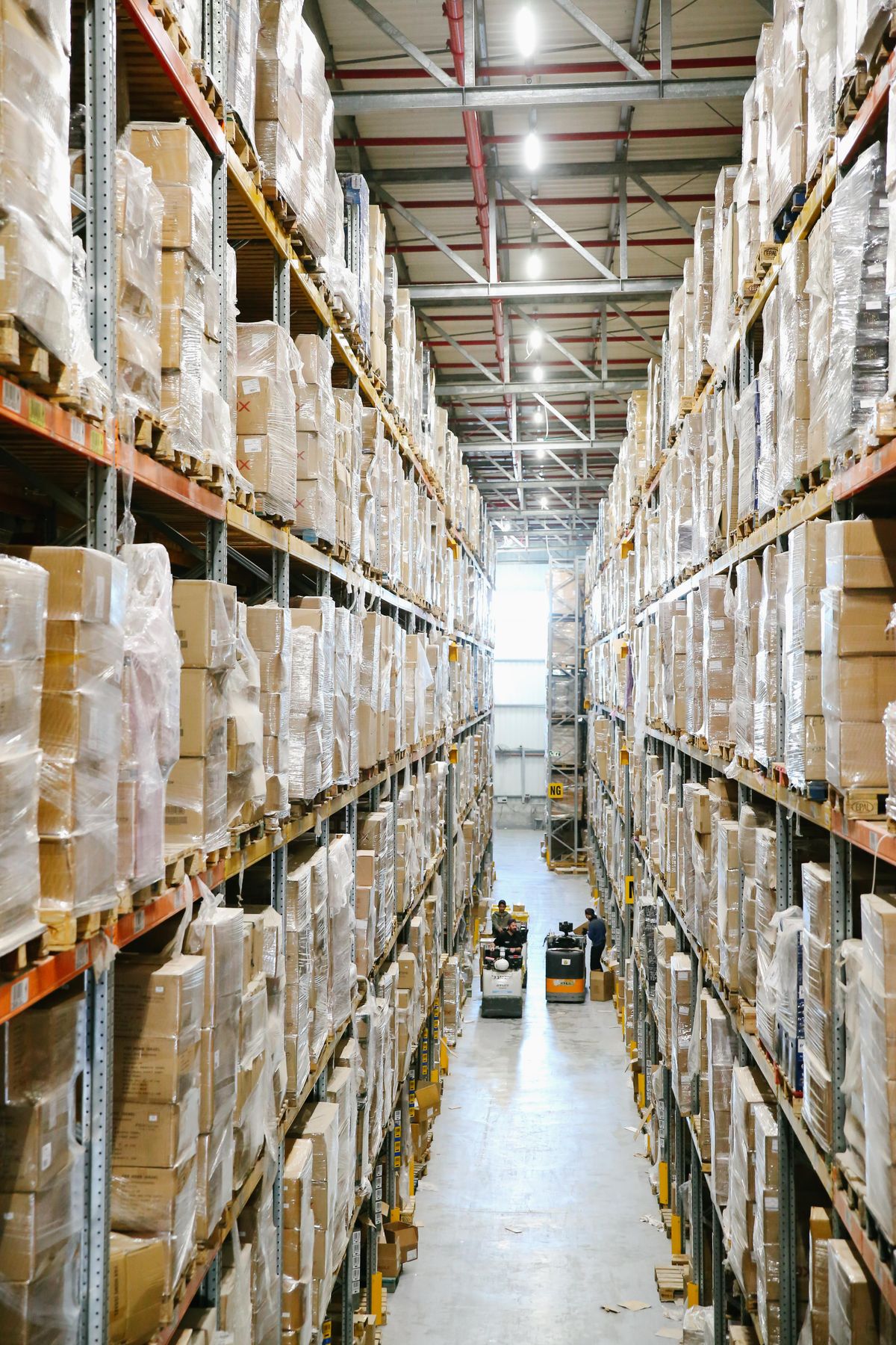 Palletised stock filling the racking of a supply warehouse